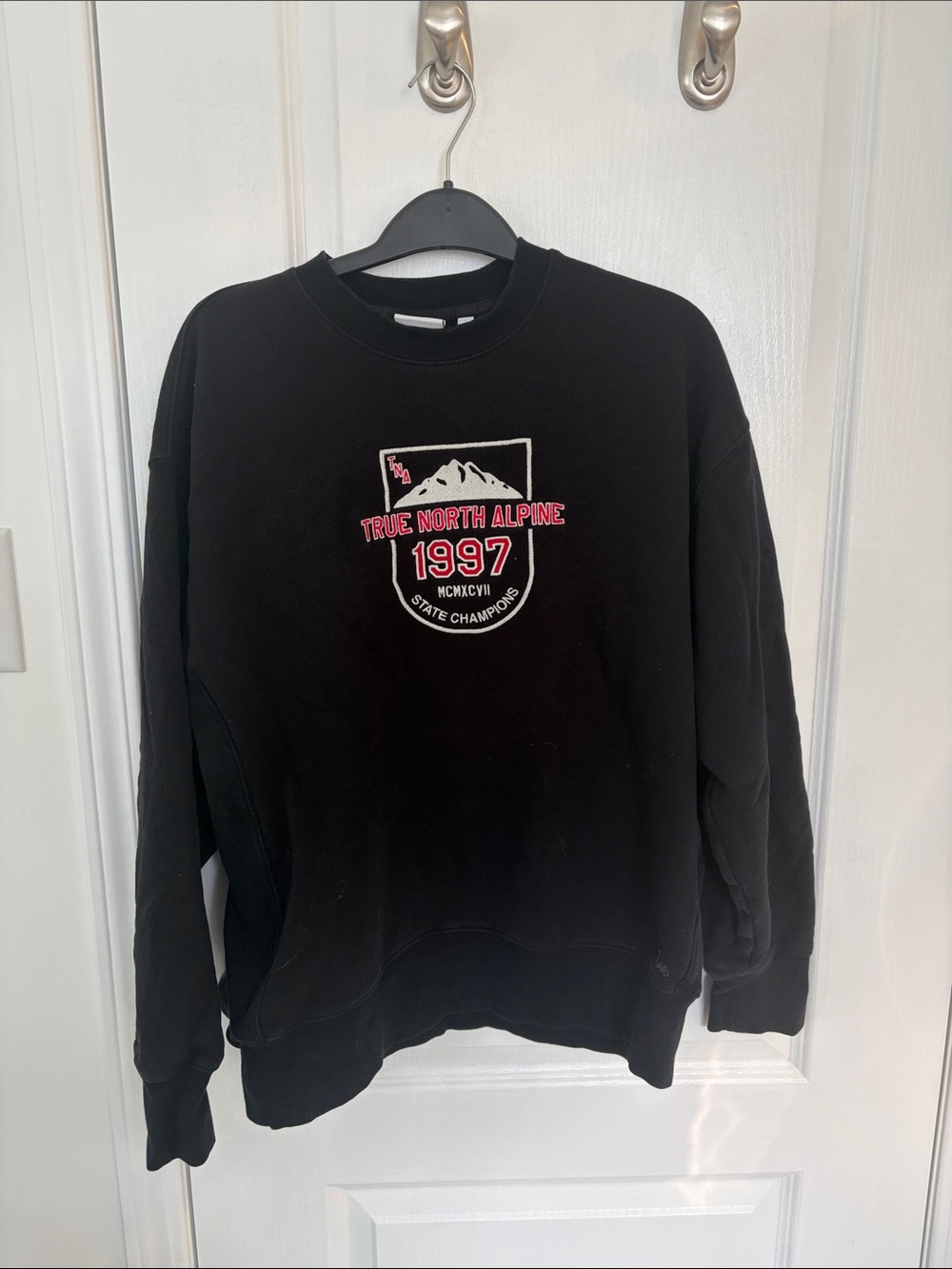 TNA Black Crewneck with Pink & White 'True North Alpine 1997' Patch